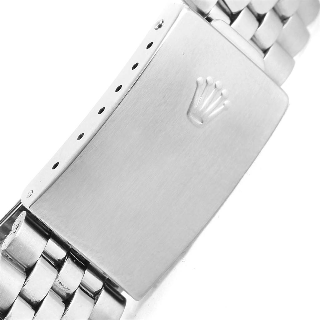 This image shows the clasp and part of the metal bracelet of the Rolex Vintage Collection 1601 Men's Stainless Steel Silver Dial 1601 Men's Stainless Steel Silver Dial watch.