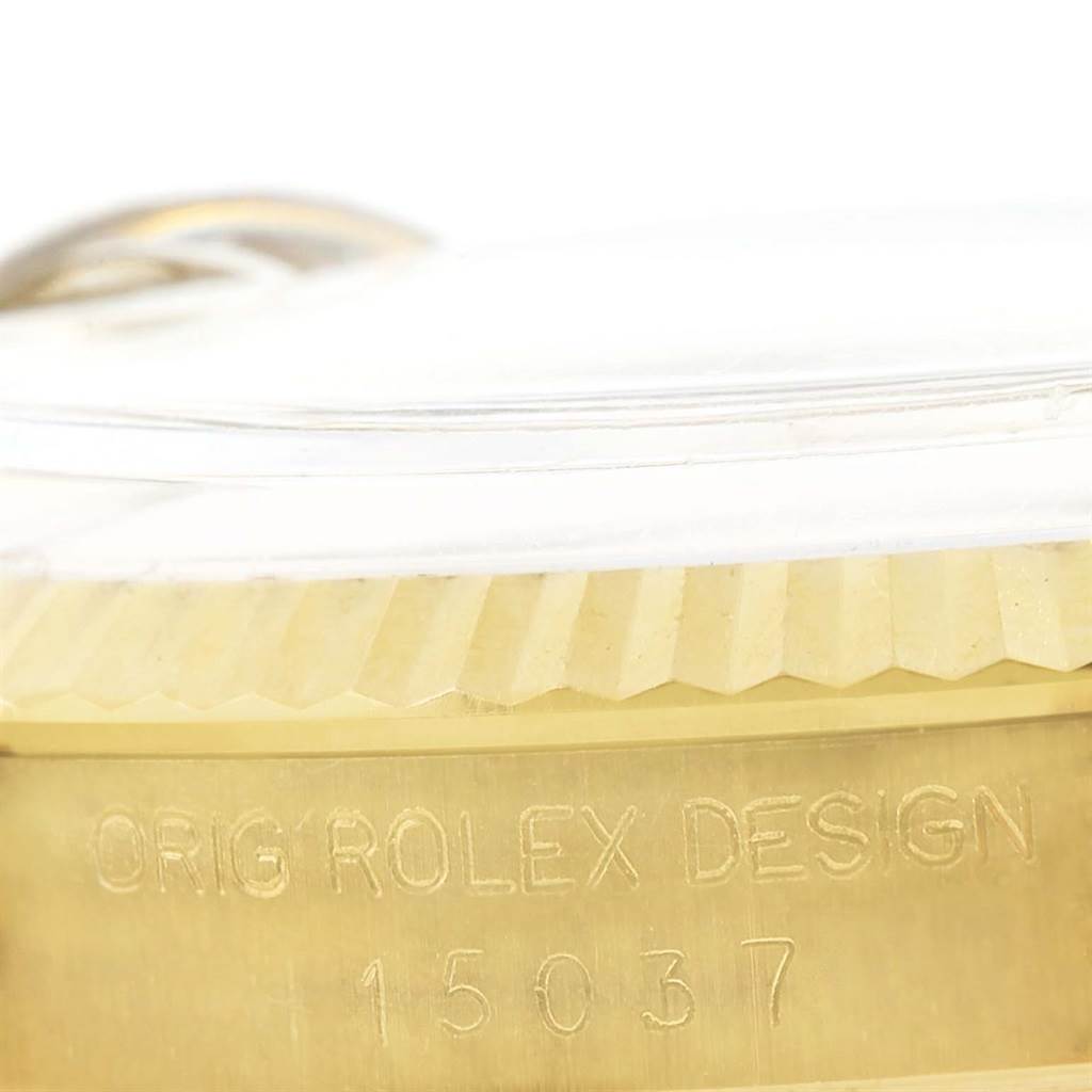 This is a close-up of the bezel and part of the case back of a Vintage Collection Rolex watch, model number 15037.