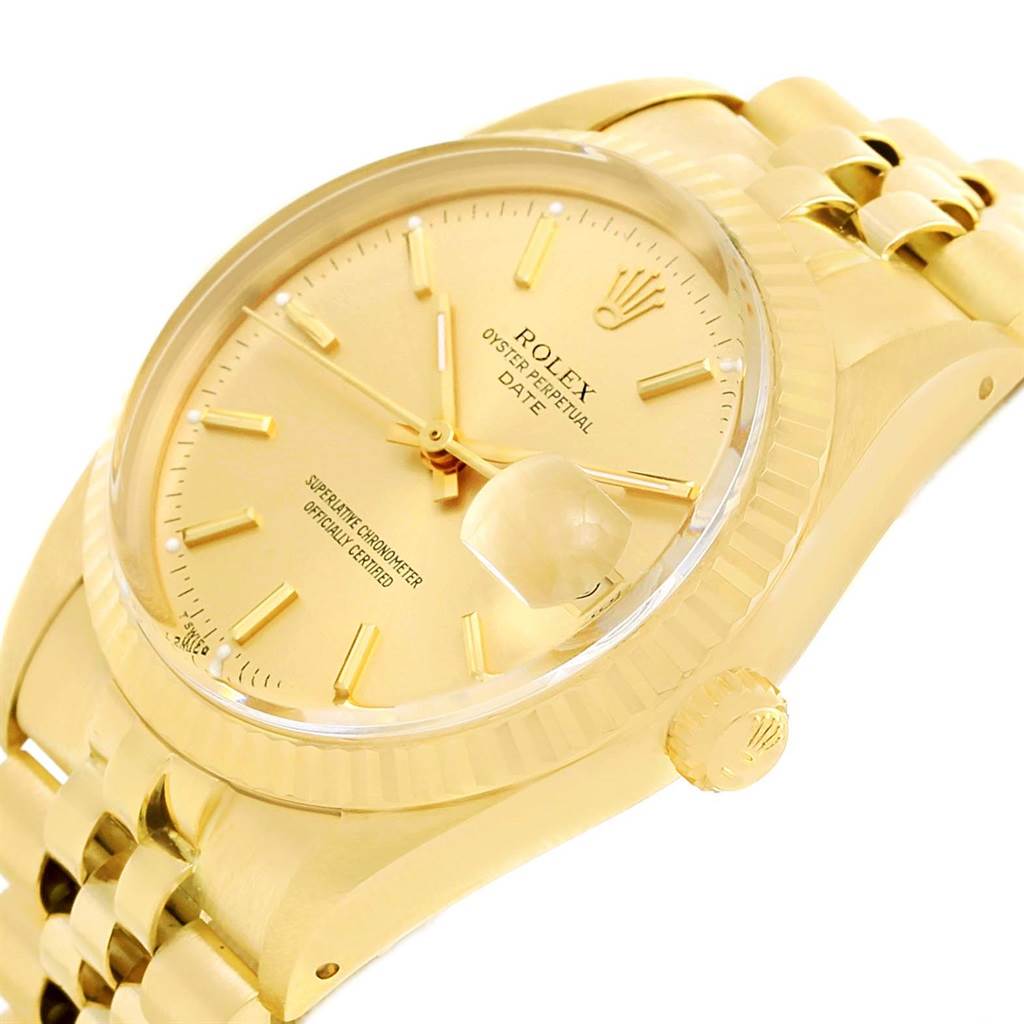 The image shows a close-up angle of the face, bezel, crown, and part of the bracelet of the Rolex Vintage Collection 15037 Men's Yellow Gold Champagne Dial 15037 Men's Yellow Gold Champagne Dial watch.