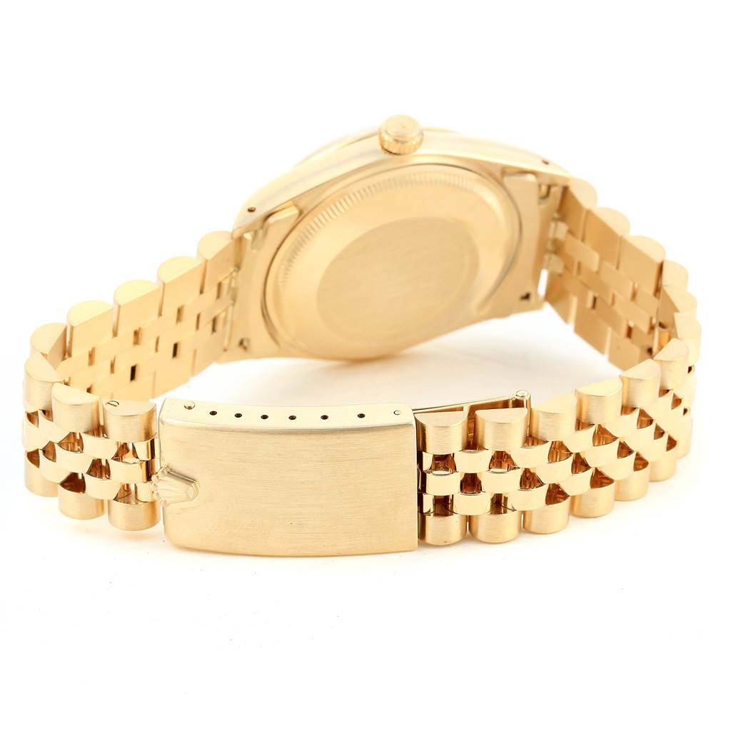 This image shows the back case and bracelet clasp of a Vintage Collection model by Rolex, viewed from the rear.