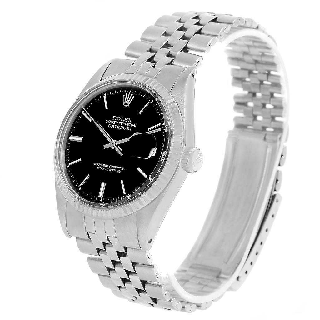 The image shows a side angle of the Rolex Oyster Perpetual Datejust Vintage Collection watch, highlighting the black dial, bracelet, and bezel.