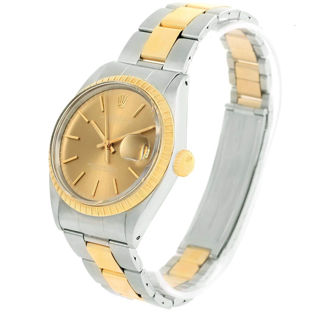 The image shows a Rolex Vintage Collection 1505 Men's Steel and Gold (two tone) Champagne Dial 1505 Men's Steel and Gold (two tone) Champagne Dial model watch at a slight angle, displaying its dial, crown, and partly open bracelet.