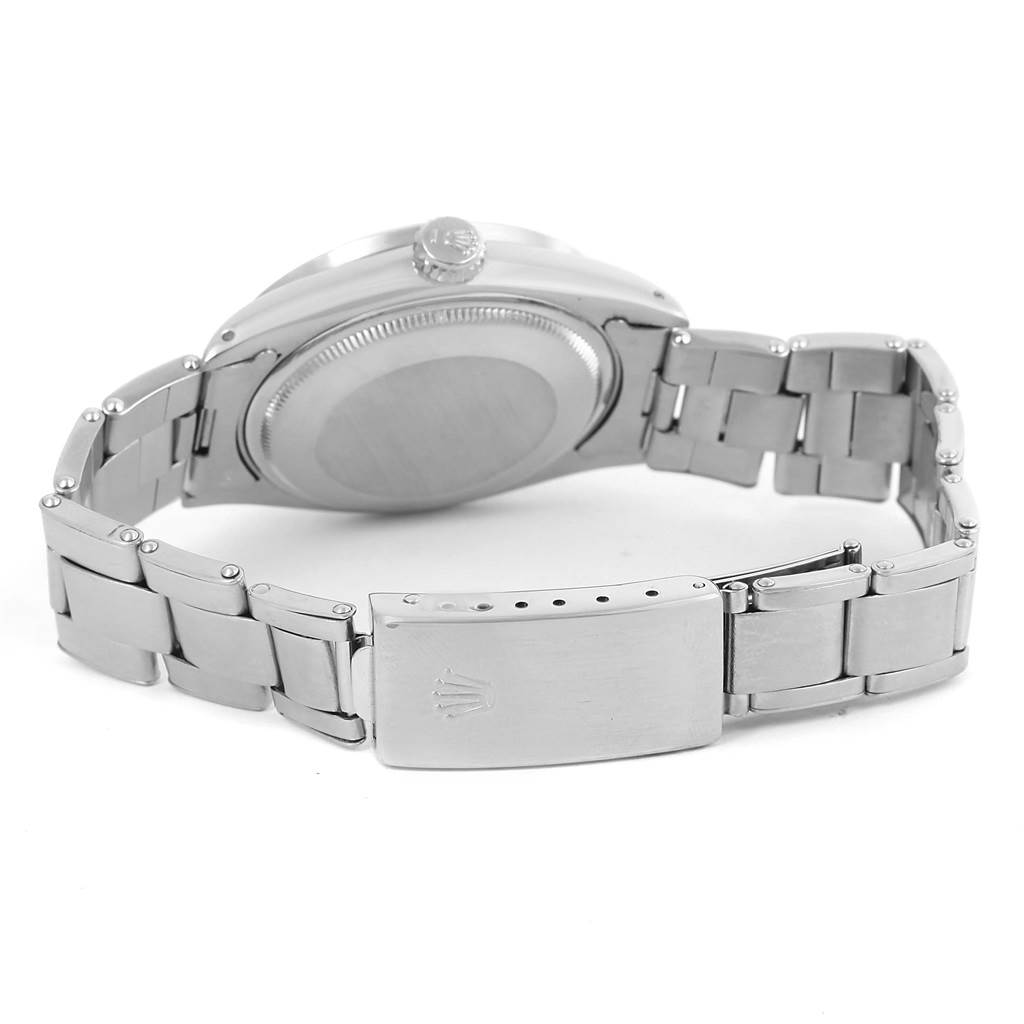 This image shows the back and clasp of a Rolex Vintage Collection 1501 Men's Stainless Steel White Dial 1501 Men's Stainless Steel White Dial watch, highlighting its bracelet and caseback.