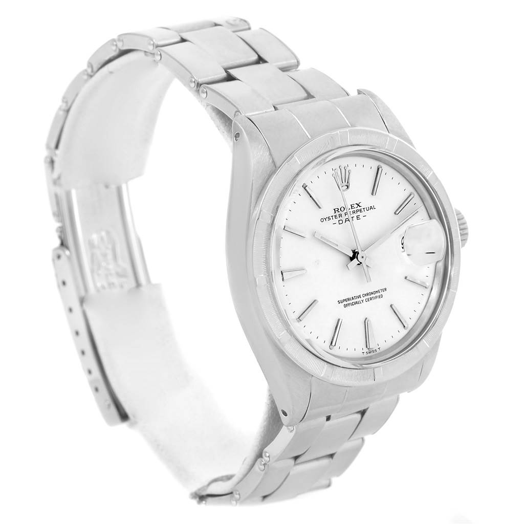 The Vintage Collection Rolex watch is shown at an angled side view, highlighting its face, bezel, bracelet, and clasp.