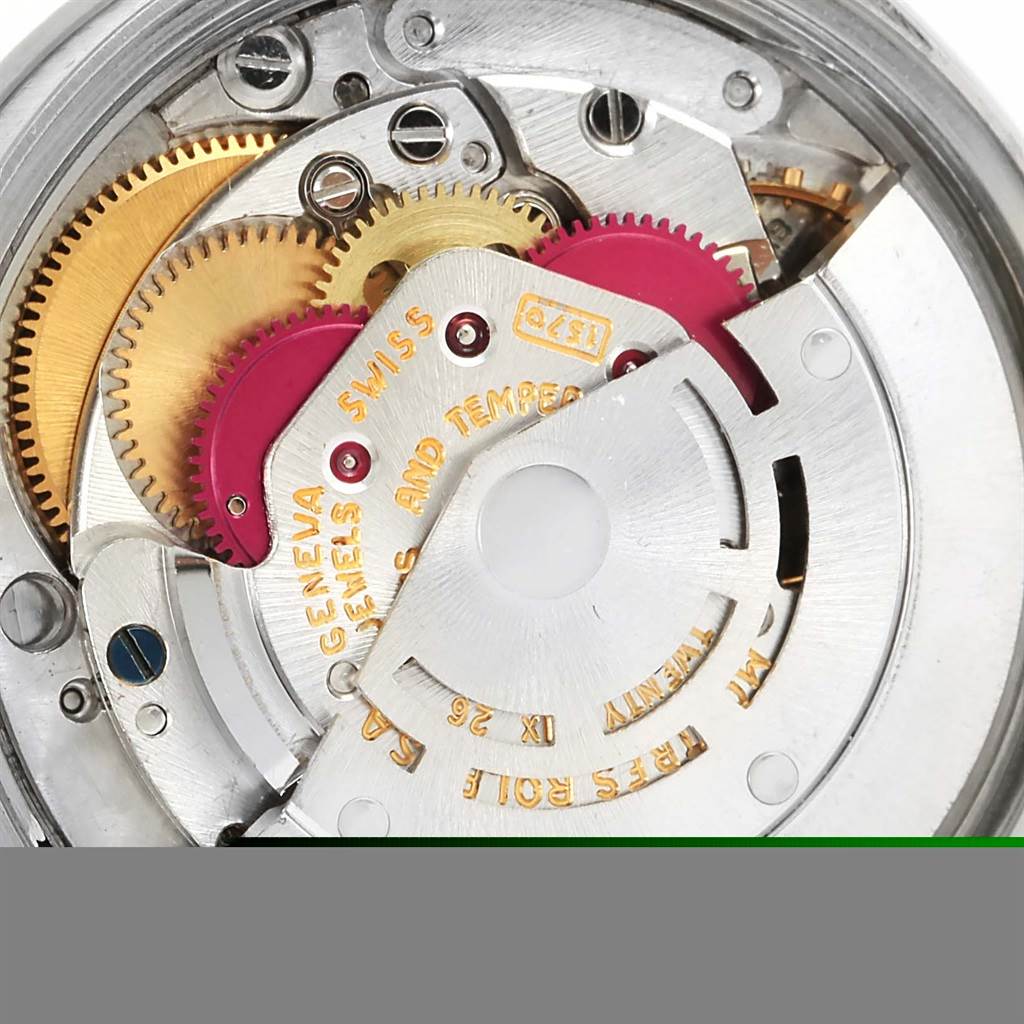 This image shows the internal movement components of a Vintage Collection Rolex watch from a close-up angle.