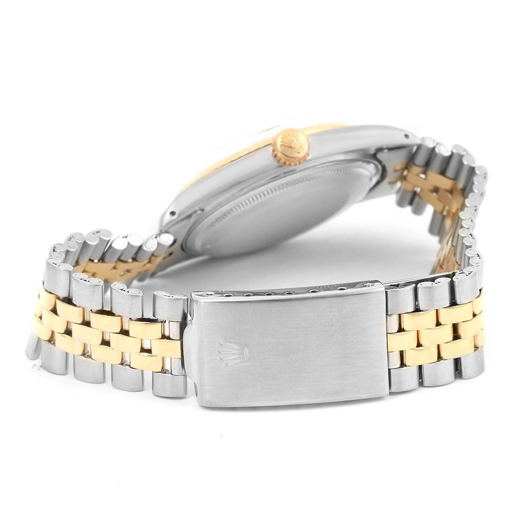 This image shows the clasp, bracelet, and side view of the case back of the Rolex Vintage Collection 1601 Men's Stainless Steel Champagne Dial 1601 Men's Stainless Steel Champagne Dial model.