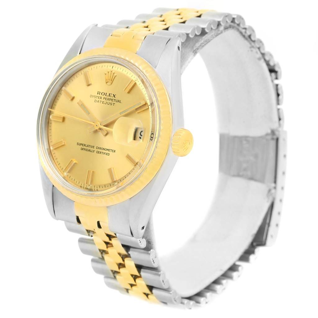 The image shows a Vintage Collection Rolex Datejust watch at a slight angle, highlighting its gold face, bezel, and two-tone bracelet.
