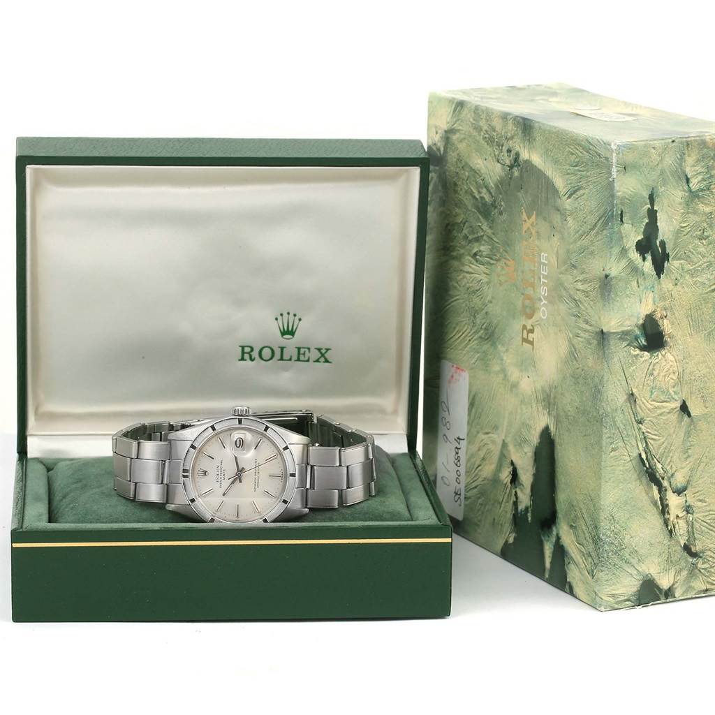 The image shows a Rolex Vintage Collection 1501 Men's Stainless Steel Silver Dial 1501 Men's Stainless Steel Silver Dial watch displayed inside its green box, with an additional outer box beside it.