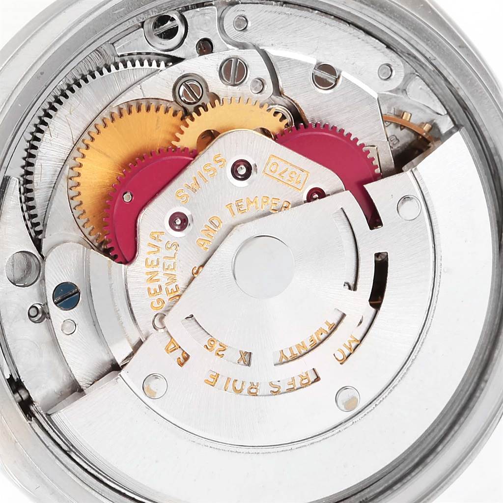 This is an inside view of the Rolex Vintage Collection 1501 Men's Stainless Steel Silver Dial 1501 Men's Stainless Steel Silver Dial watch, showing its intricate movement components and gears.