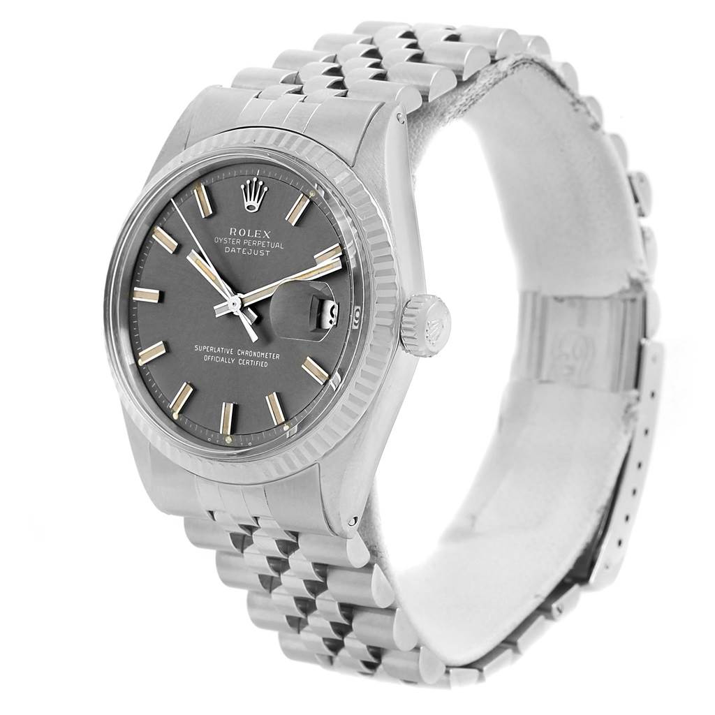 This image shows a Rolex Vintage Collection 1603 Men's Stainless Steel Grey Dial 1603 Men's Stainless Steel Grey Dial Oyster Perpetual Datejust watch from a three-quarter angle, highlighting its face, bezel, and bracelet.