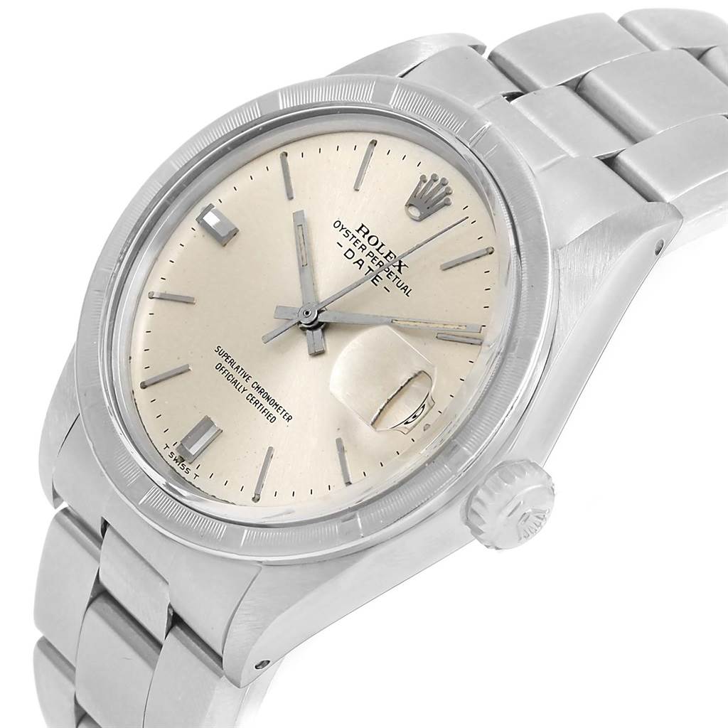 This image shows the face, bezel, and part of the bracelet of a Rolex Vintage Collection 1500 Men's Stainless Steel Silver Dial 1500 Men's Stainless Steel Silver Dial Oyster Perpetual Date watch at a slight angle.
