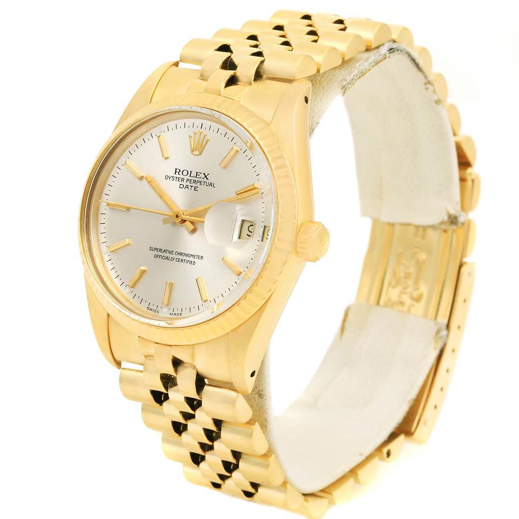 The image shows a side angle of a gold Rolex Vintage Collection 15037 Men's Yellow Gold Silver Dial 15037 Men's Yellow Gold Silver Dial model, highlighting the face, bezel, crown, and bracelet.