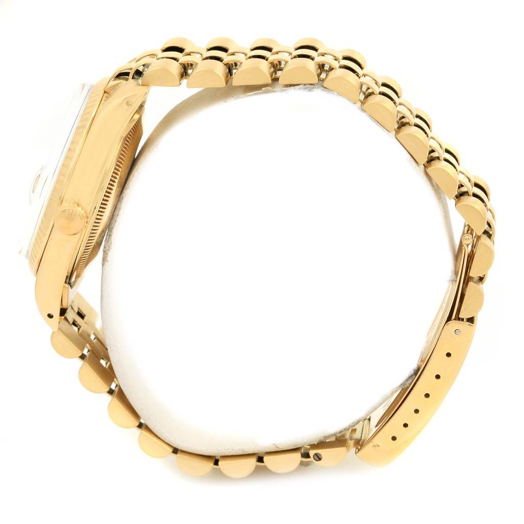 The image shows a side view of the Rolex Vintage Collection 15037 Men's Yellow Gold Silver Dial 15037 Men's Yellow Gold Silver Dial watch, highlighting the bracelet and part of the case.