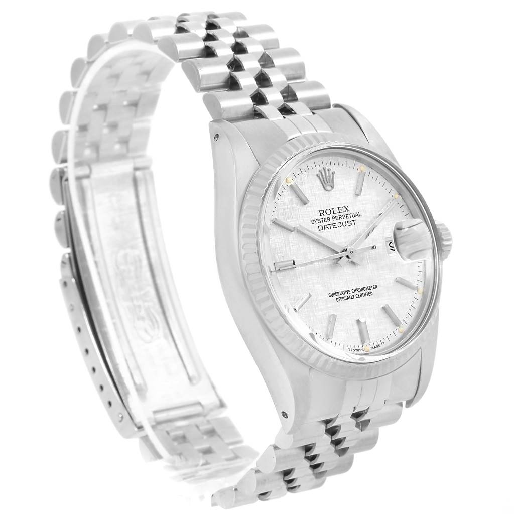 The image shows a side angle of the Rolex Vintage Collection 16014 Men's Stainless Steel Silver Dial 16014 Men's Stainless Steel Silver Dial Datejust, highlighting its metallic bracelet and dial.