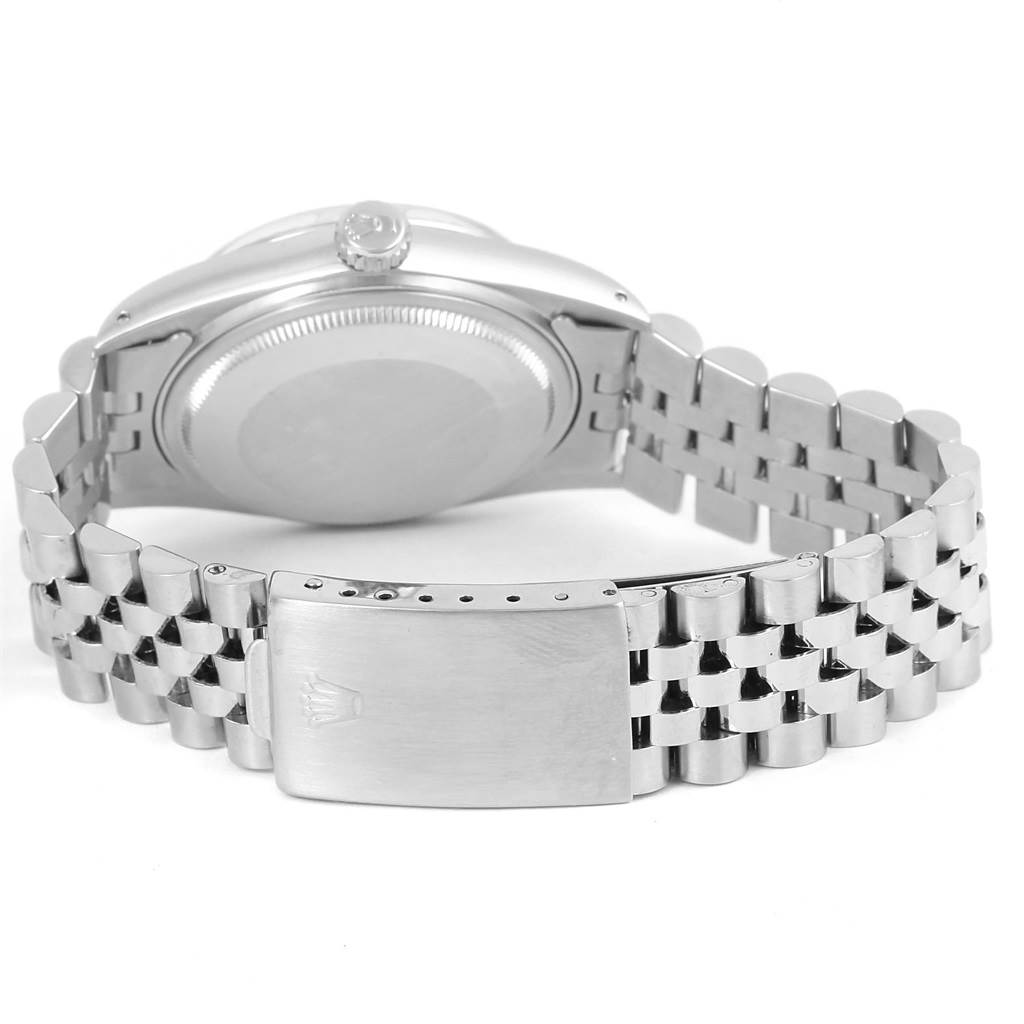 The image shows the back of a Rolex Vintage Collection 16014 Men's Stainless Steel Silver Dial 16014 Men's Stainless Steel Silver Dial watch, including the casing, crown, and bracelet clasp.