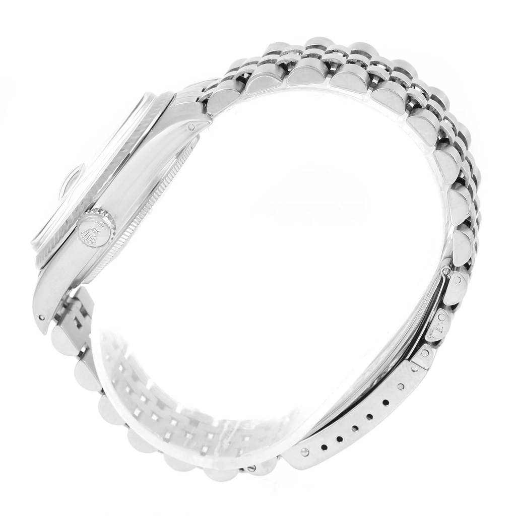 This image shows a side profile of the Rolex Vintage Collection 16014 Men's Stainless Steel Silver Dial 16014 Men's Stainless Steel Silver Dial model, highlighting its case, crown, and bracelet.