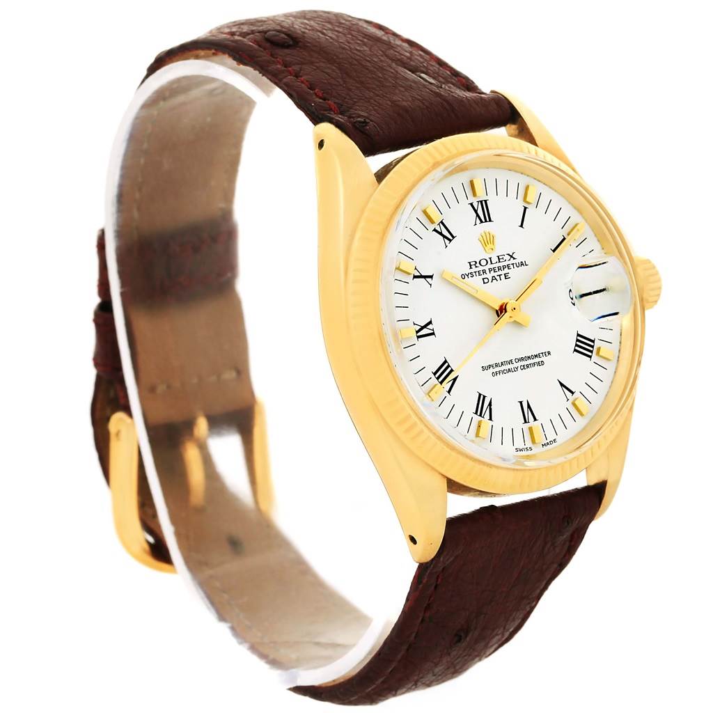 The image shows a side angle view of a Rolex Vintage Collection 1503 Men's Yellow Gold White Dial 1503 Men's Yellow Gold White Dial watch, highlighting the face, bezel, and leather strap.