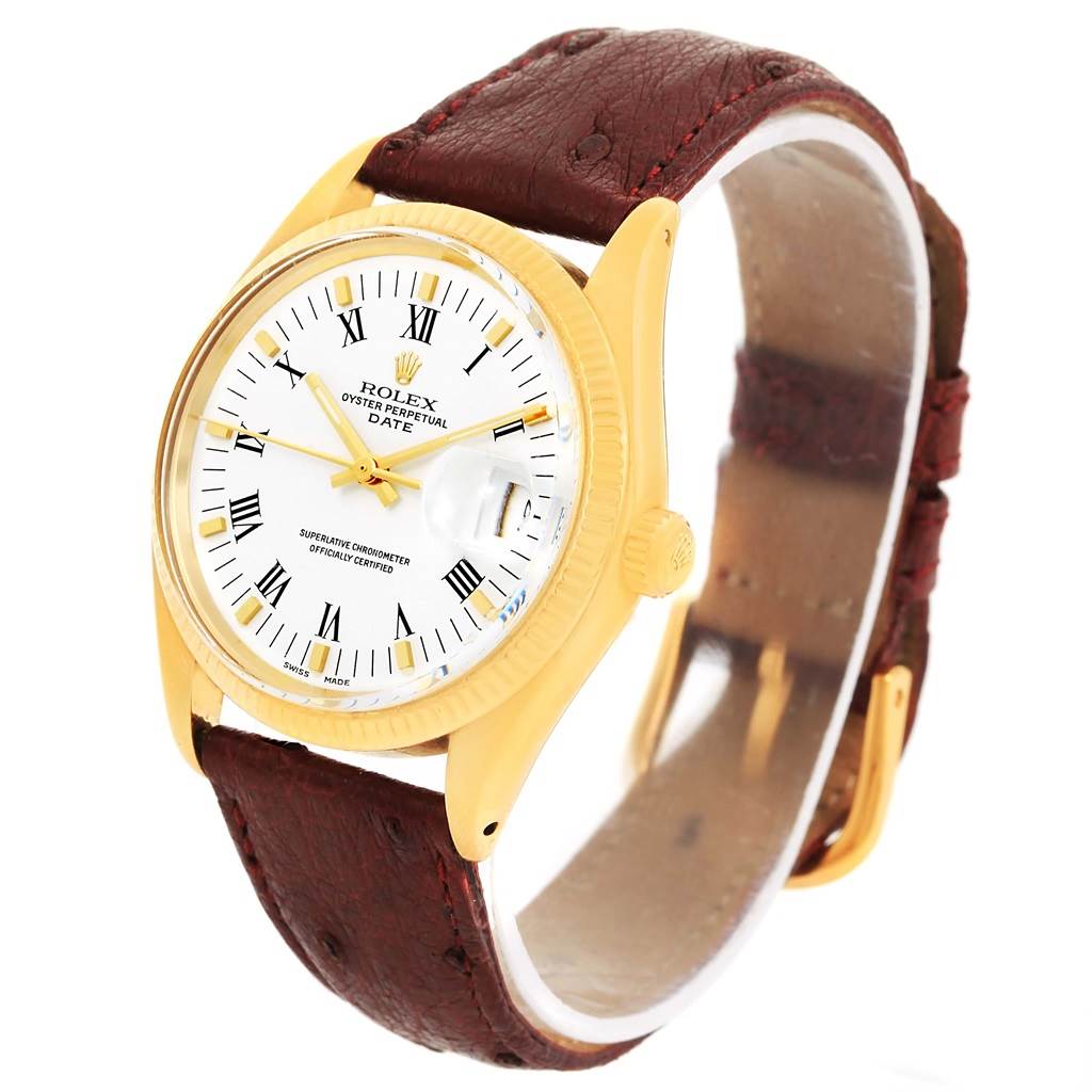 The image shows a front angle of a Rolex Vintage Collection 1503 Men's Yellow Gold White Dial 1503 Men's Yellow Gold White Dial watch, highlighting its gold case, white dial, and brown leather strap.