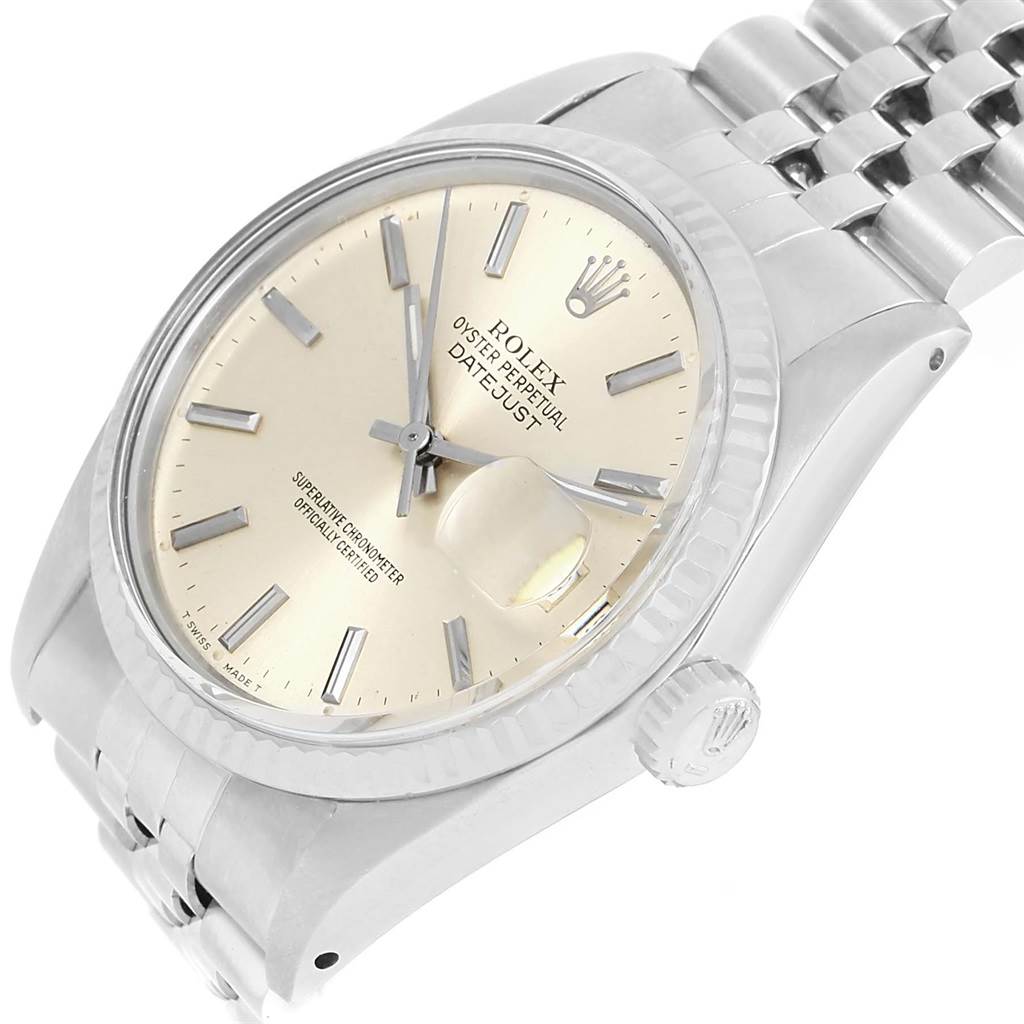 The image shows a Rolex Vintage Collection 16014 Men's Stainless Steel Silver Dial 16014 Men's Stainless Steel Silver Dial Datejust watch at an angle, highlighting the face, crown, dial, and part of the bracelet.