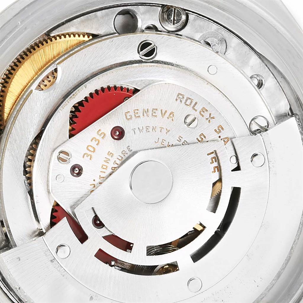 This image shows a close-up of the internal mechanism of a Rolex Vintage Collection 16014 Men's Stainless Steel Silver Dial 16014 Men's Stainless Steel Silver Dial 3035 model watch, highlighting gears and components.