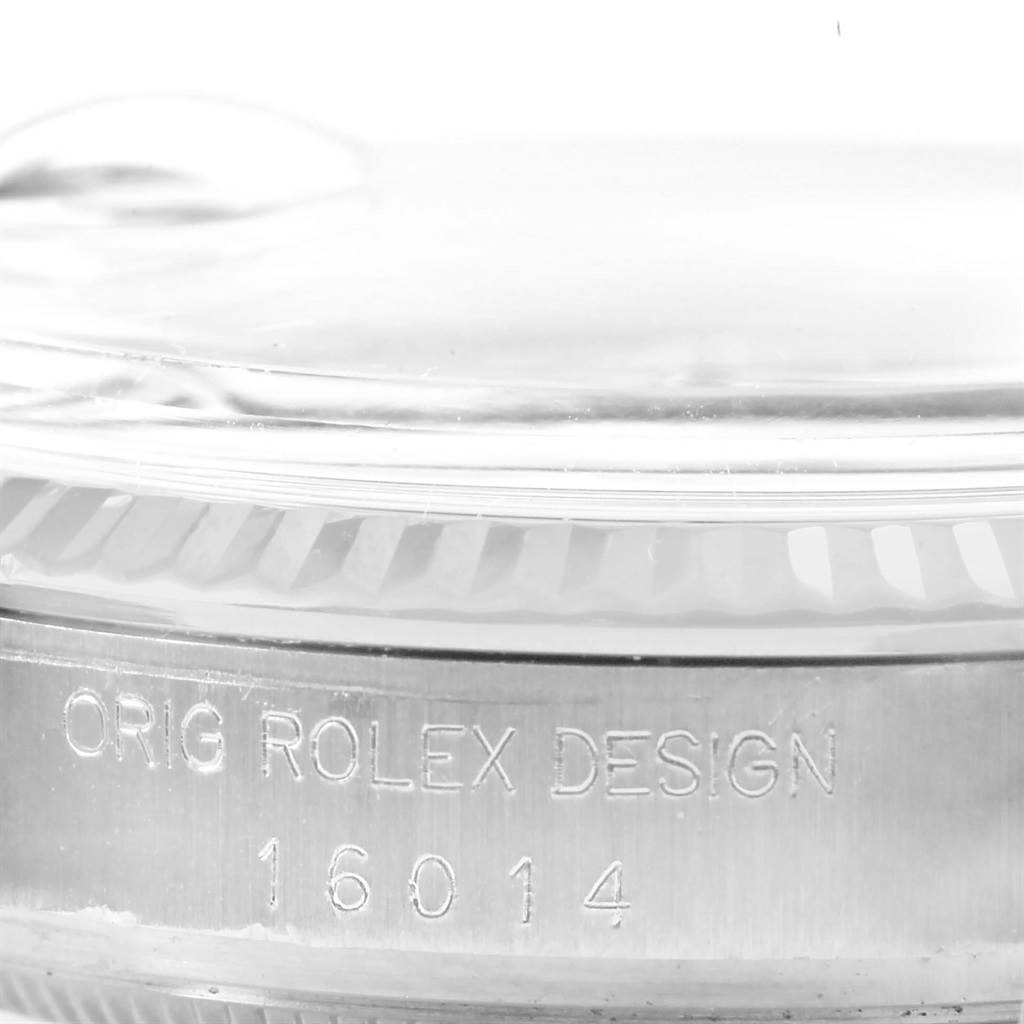 This image shows the side profile and bezel with model number 16014 engraved on a Rolex Vintage Collection 16014 Men's Stainless Steel Silver Dial 16014 Men's Stainless Steel Silver Dial watch.