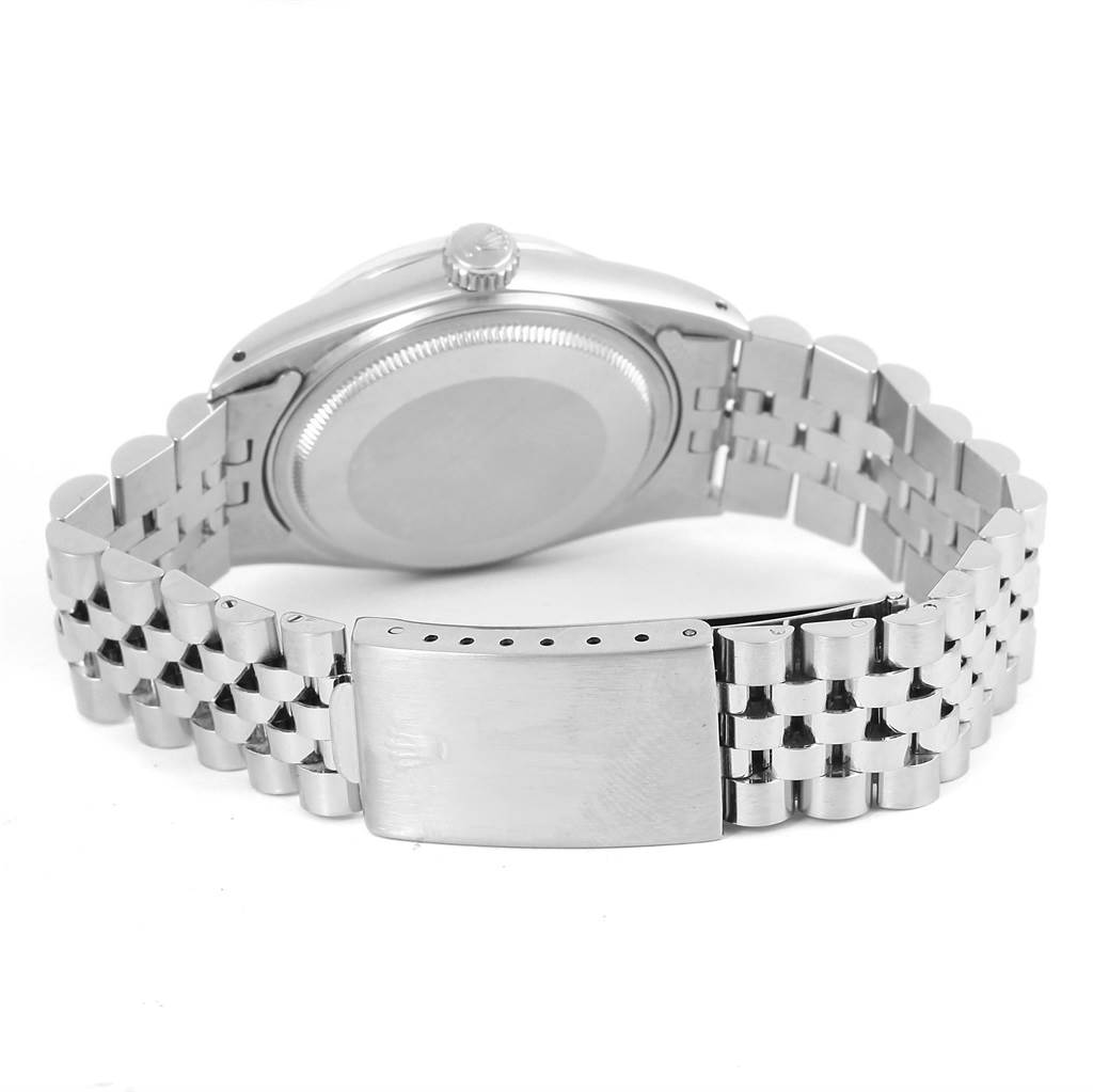 The image shows the back view of a Rolex Vintage Collection 16014 Men's Stainless Steel Silver Dial 16014 Men's Stainless Steel Silver Dial watch, highlighting the case, crown, and Jubilee bracelet with clasp.