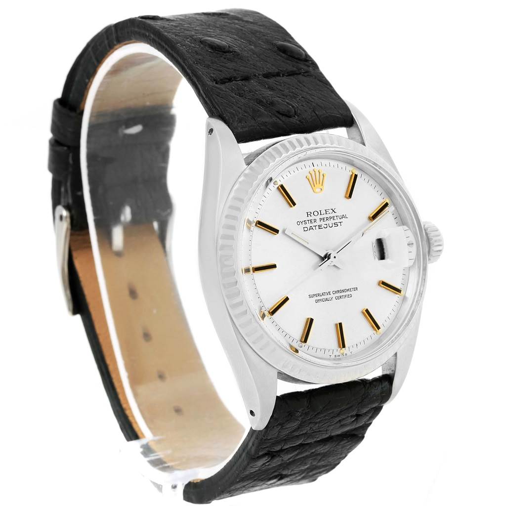 The image shows a Rolex Vintage Collection 1601 Men's Stainless Steel Black Dial 1601 Men's Stainless Steel Black Dial Datejust watch from a side angle, highlighting the dial, bezel, crown, and leather strap.