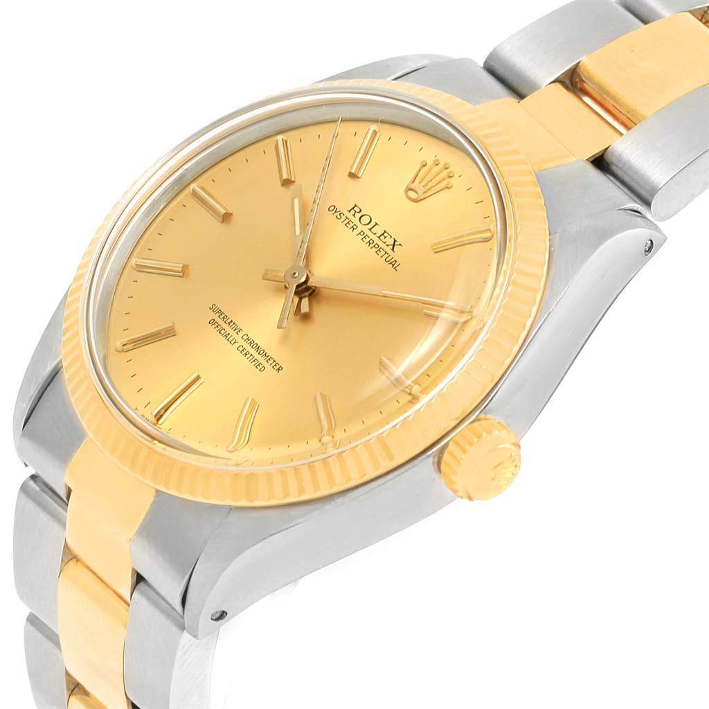 The image shows a close-up angled view of the Rolex Vintage Collection 1005 Men's Steel and Gold (two tone) Champagne Dial 1005 Men's Steel and Gold (two tone) Champagne Dial watch, highlighting its gold dial and two-tone bracelet.
