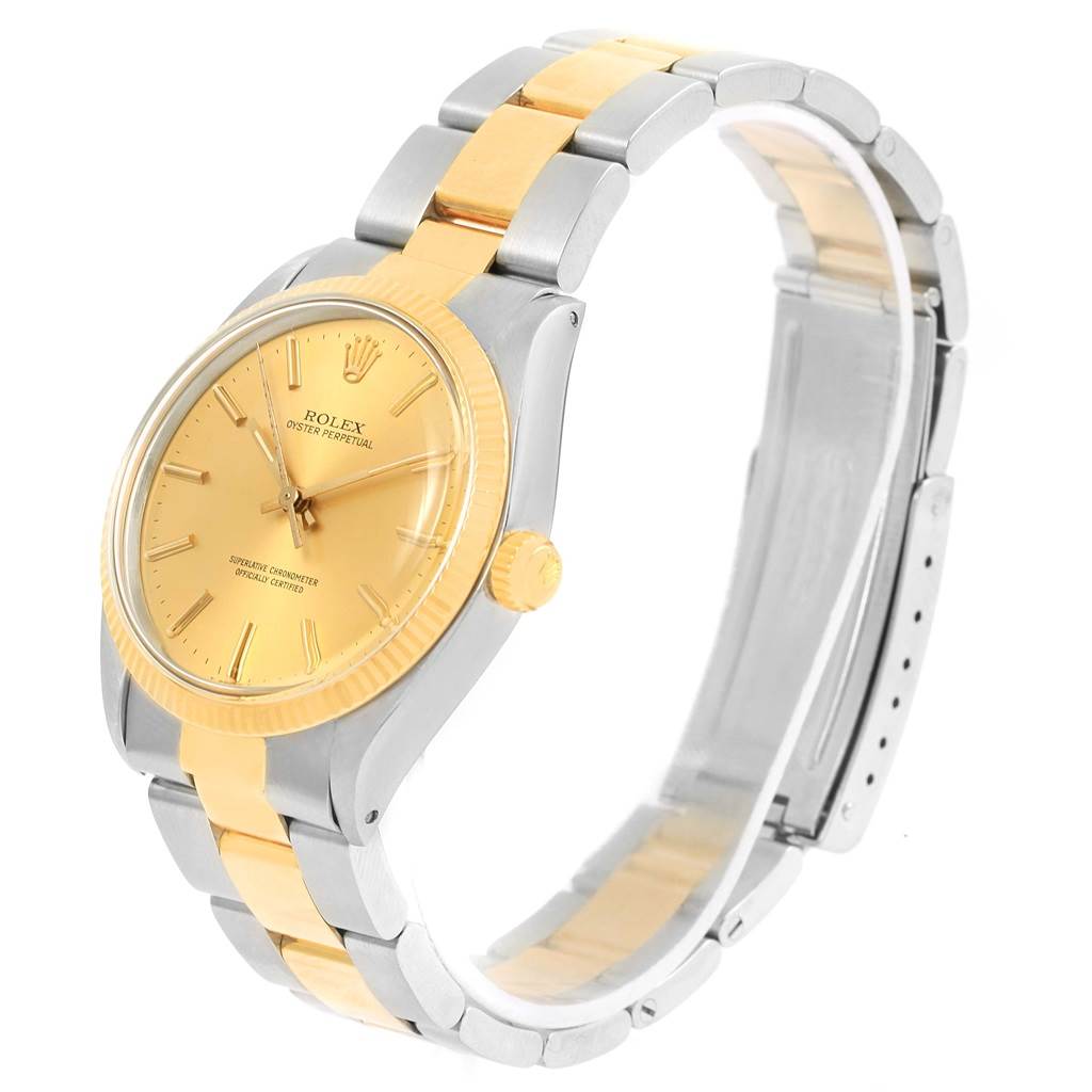 The Vintage Collection Rolex watch is shown at a 3/4 angle highlighting its dial, bezel, crown, and bracelet.