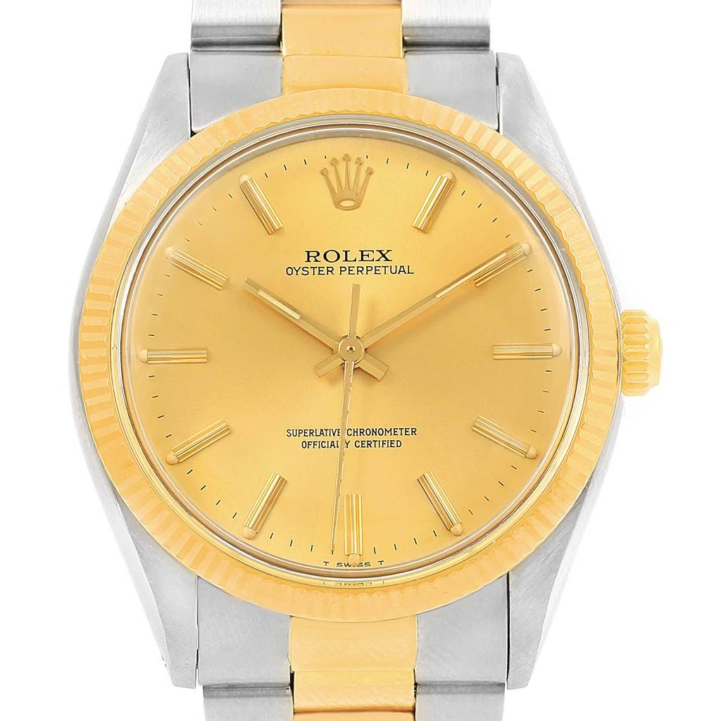 This image shows a Rolex Vintage Collection 1005 Men's Steel and Gold (two tone) Champagne Dial 1005 Men's Steel and Gold (two tone) Champagne Dial watch from a front angle, highlighting its face, bezel, and part of the bracelet.
