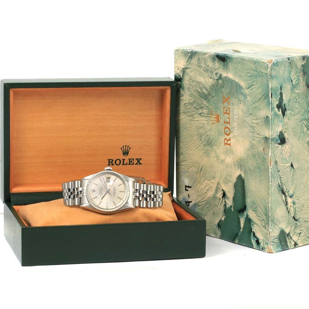 The Rolex Vintage Collection 16014 Men's Stainless Steel Silver Dial 16014 Men's Stainless Steel Silver Dial model is displayed in an open box, showing the face and band, with another box placed beside it.