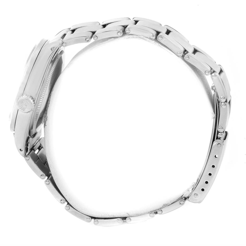 The Rolex Vintage Collection 1501 Men's Stainless Steel Silver Dial 1501 Men's Stainless Steel Silver Dial watch is shown from a side angle, highlighting its bracelet and case with the crown visible.