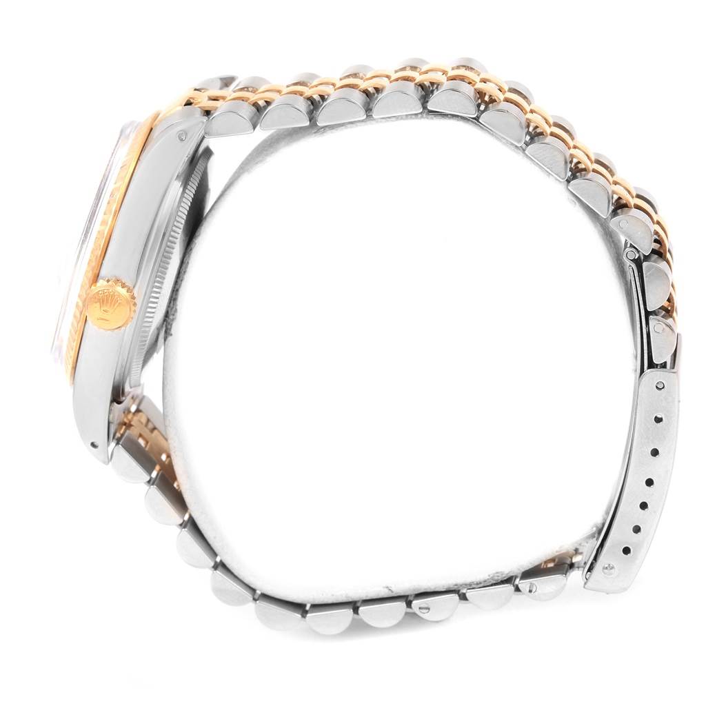 The image shows a side view of the Rolex Vintage Collection ROLEX DATEJUST STEEL YELLOW GOLD TAPESTRY DIAL VINTAGE MENS WATCH 16013 Men's Stainless Steel Silver Dial ROLEX DATEJUST STEEL YELLOW GOLD TAPESTRY DIAL VINTAGE MENS WATCH 16013 Men's Stainless Steel Silver Dial watch, highlighting the crown and part of the bracelet.