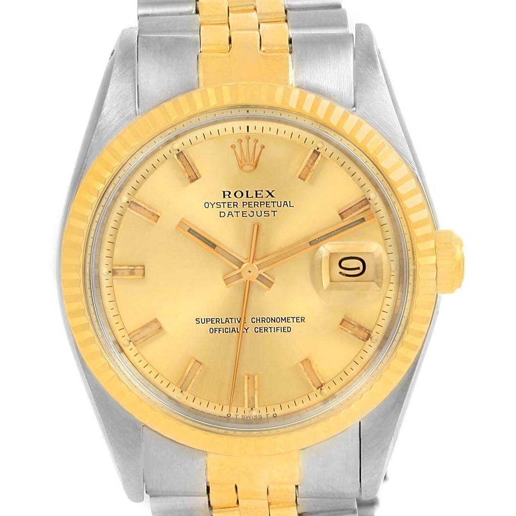 The Rolex Vintage Collection 1601 Men's Stainless Steel Champagne Dial 1601 Men's Stainless Steel Champagne Dial Datejust watch is shown from a top-down angle, highlighting its gold dial, bezel, and two-tone bracelet.