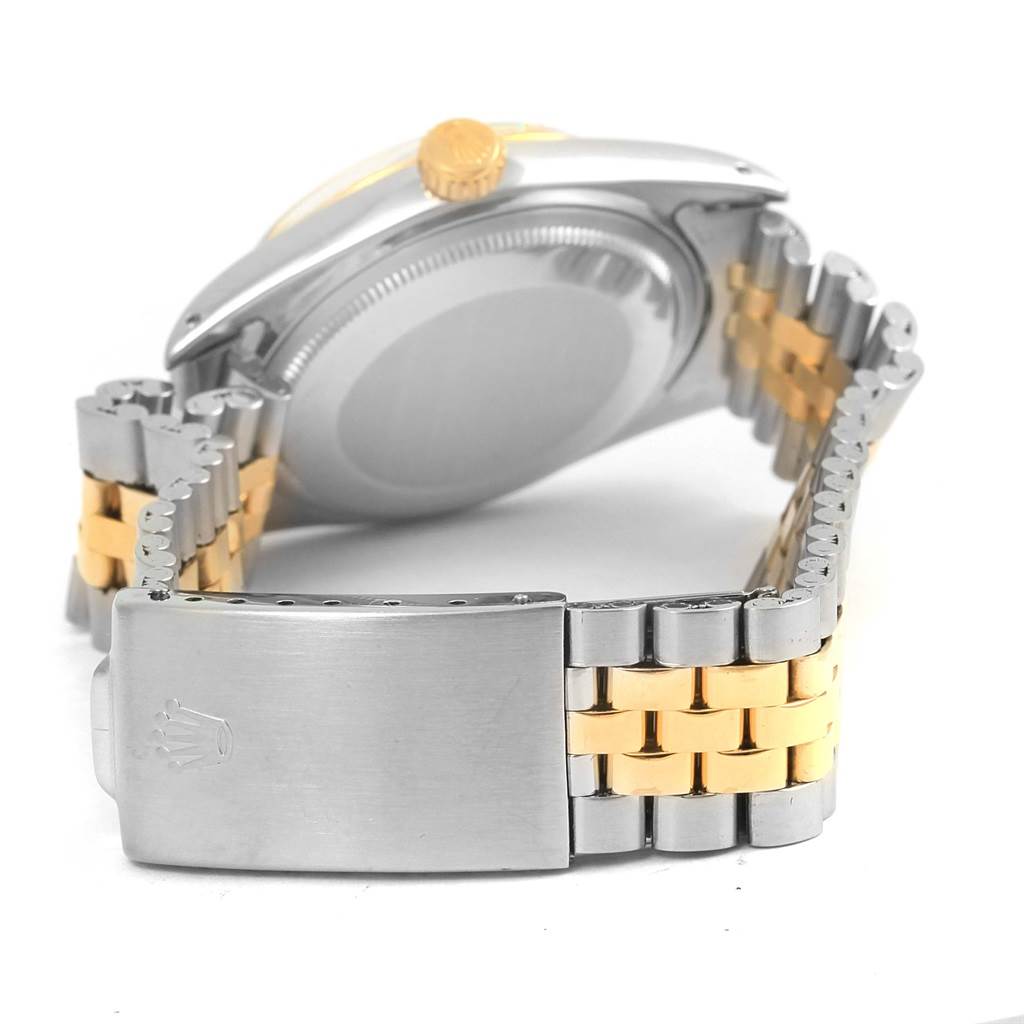 The image shows the back and lugs of the Rolex Vintage Collection 1601 Men's Stainless Steel Champagne Dial 1601 Men's Stainless Steel Champagne Dial watch with a two-tone metal bracelet and clasp.