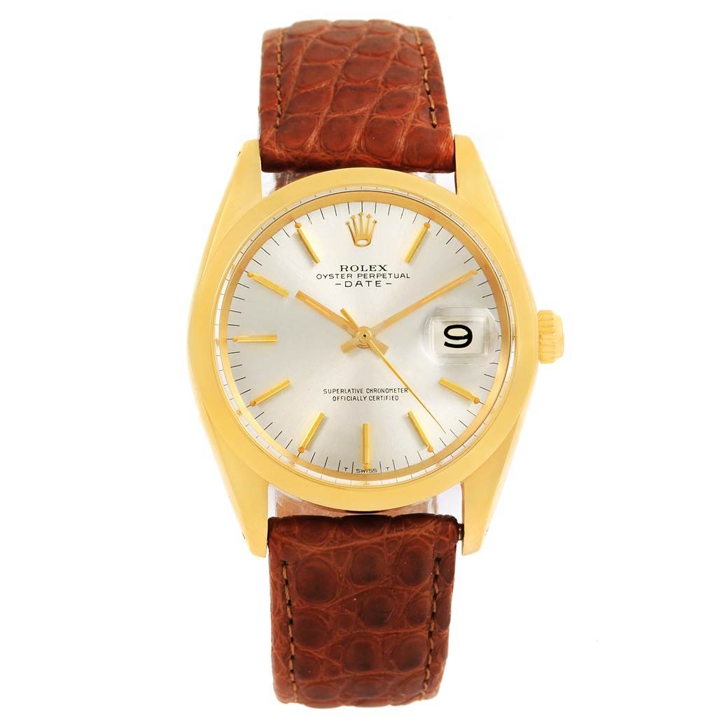 The image shows a front view of the Vintage Collection Rolex Oyster Perpetual Date with a gold case and brown leather strap.