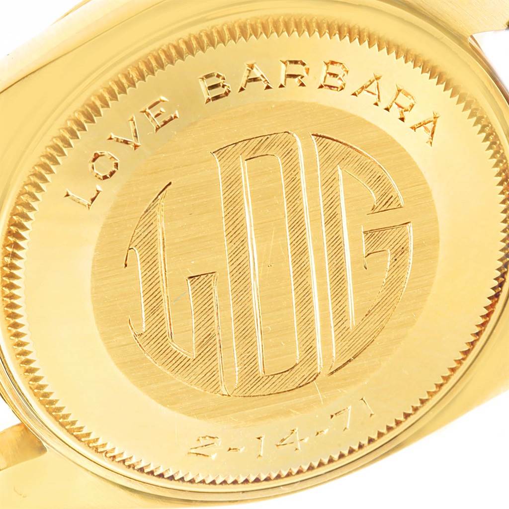 The image displays the engraved case back of a Rolex Vintage Collection 1500 Men's Yellow Gold Champagne Dial 1500 Men's Yellow Gold Champagne Dial watch.