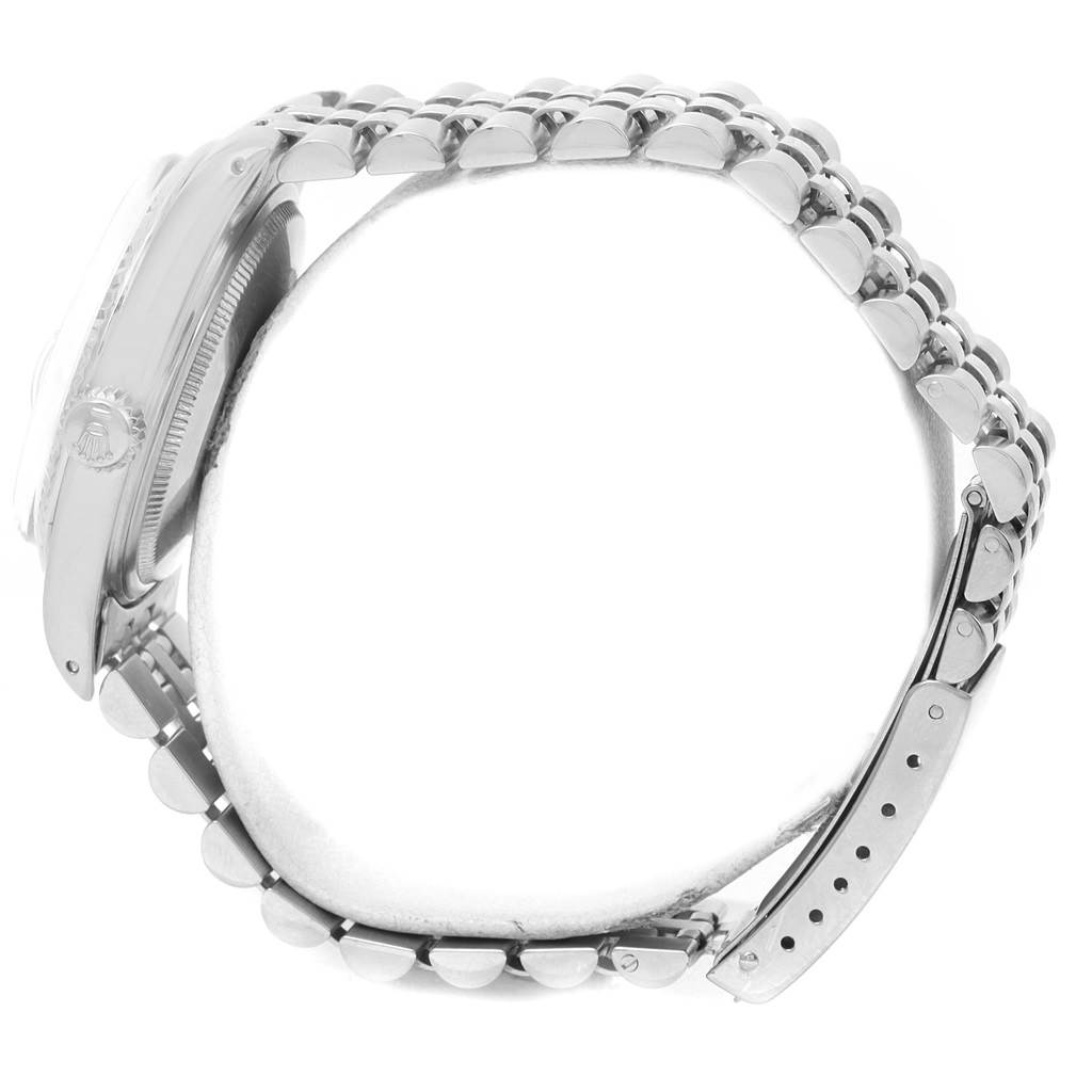 This image shows a side view of the Vintage Collection Rolex watch, focusing on the case, crown, and bracelet.