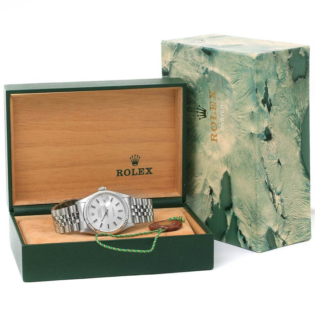 The image shows a Rolex Vintage Collection 16014 Men's Stainless Steel Silver Dial 16014 Men's Stainless Steel Silver Dial watch in its open display box, with the dial, strap, and a tag visible.