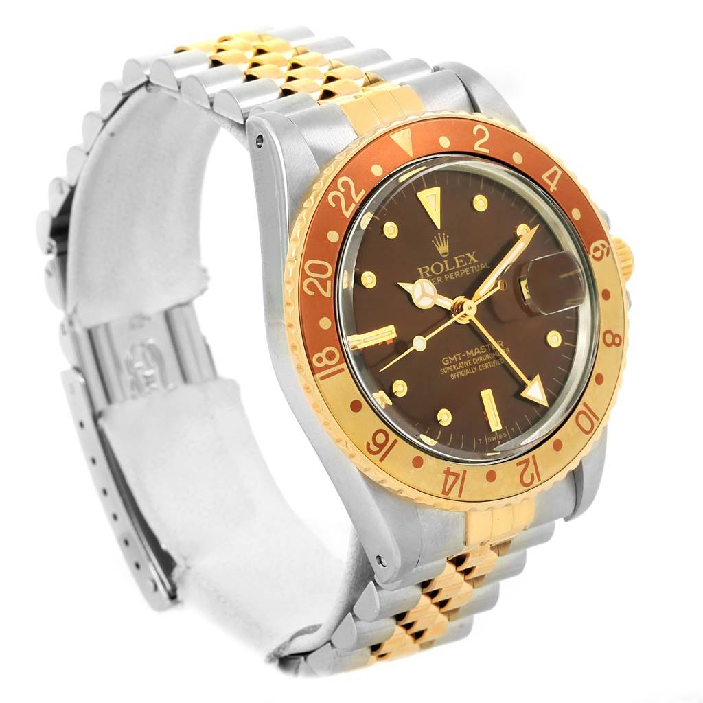 The image displays a side angle of a Rolex Vintage Collection 16753 Men's Stainless Steel Brown Dial 16753 Men's Stainless Steel Brown Dial GMT-Master watch, showcasing its bezel, dial, and bracelet.