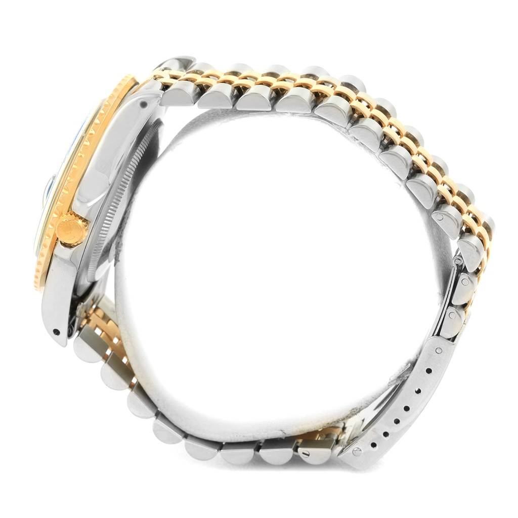 The image shows the side view of a Rolex Vintage Collection 16753 Men's Stainless Steel Brown Dial 16753 Men's Stainless Steel Brown Dial model watch with a two-tone metal band and crown.