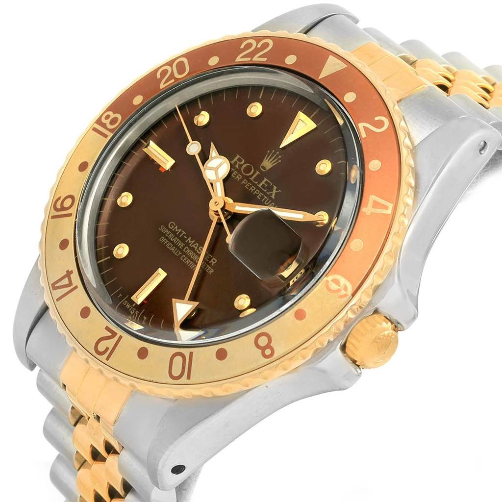 This image shows a Rolex Vintage Collection 16753 Men's Stainless Steel Brown Dial 16753 Men's Stainless Steel Brown Dial GMT-Master watch, featuring a close-up angle with a brown-and-gold bezel and a two-tone strap.
