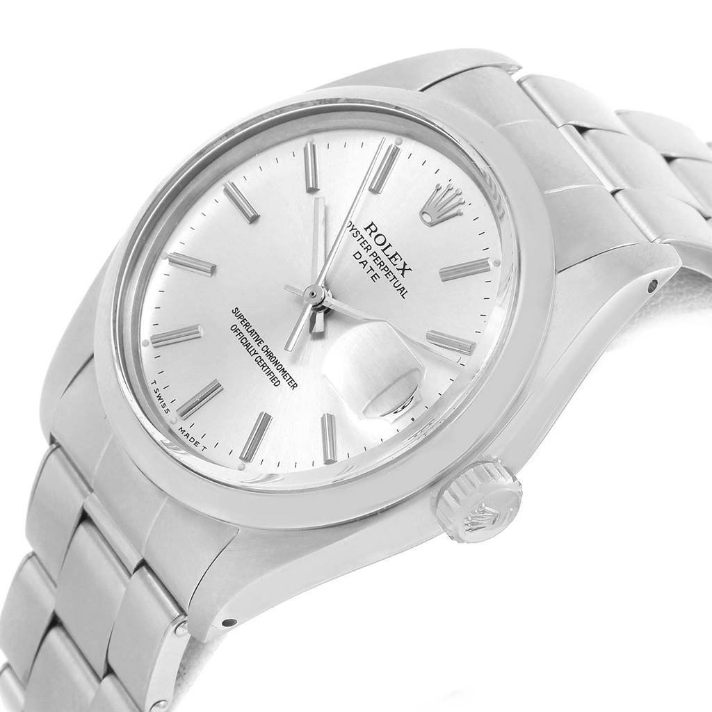 The image shows a side and front angle of a Rolex Vintage Collection 1500 Men's Stainless Steel Silver Dial 1500 Men's Stainless Steel Silver Dial model, displaying its face, crown, and metal bracelet.