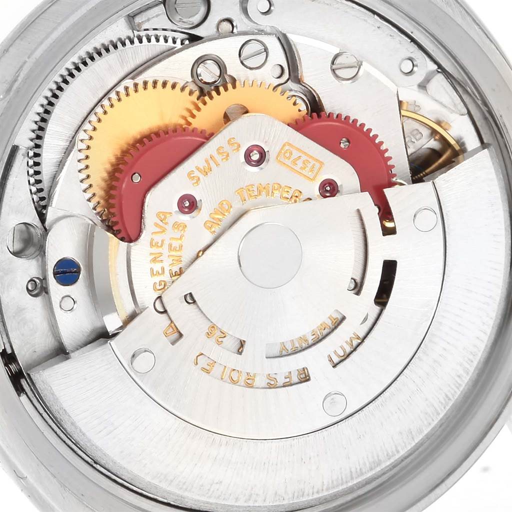 This image shows the intricate inner workings and movement parts of a Vintage Collection Rolex watch.