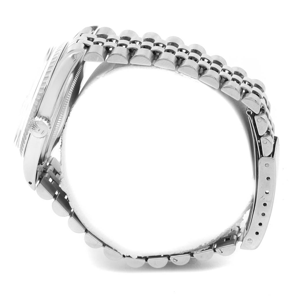 The image shows a side view of a Rolex Vintage Collection 1603 Men's Stainless Steel Silver Dial 1603 Men's Stainless Steel Silver Dial watch, highlighting its stainless steel bracelet and the watch case including the crown.