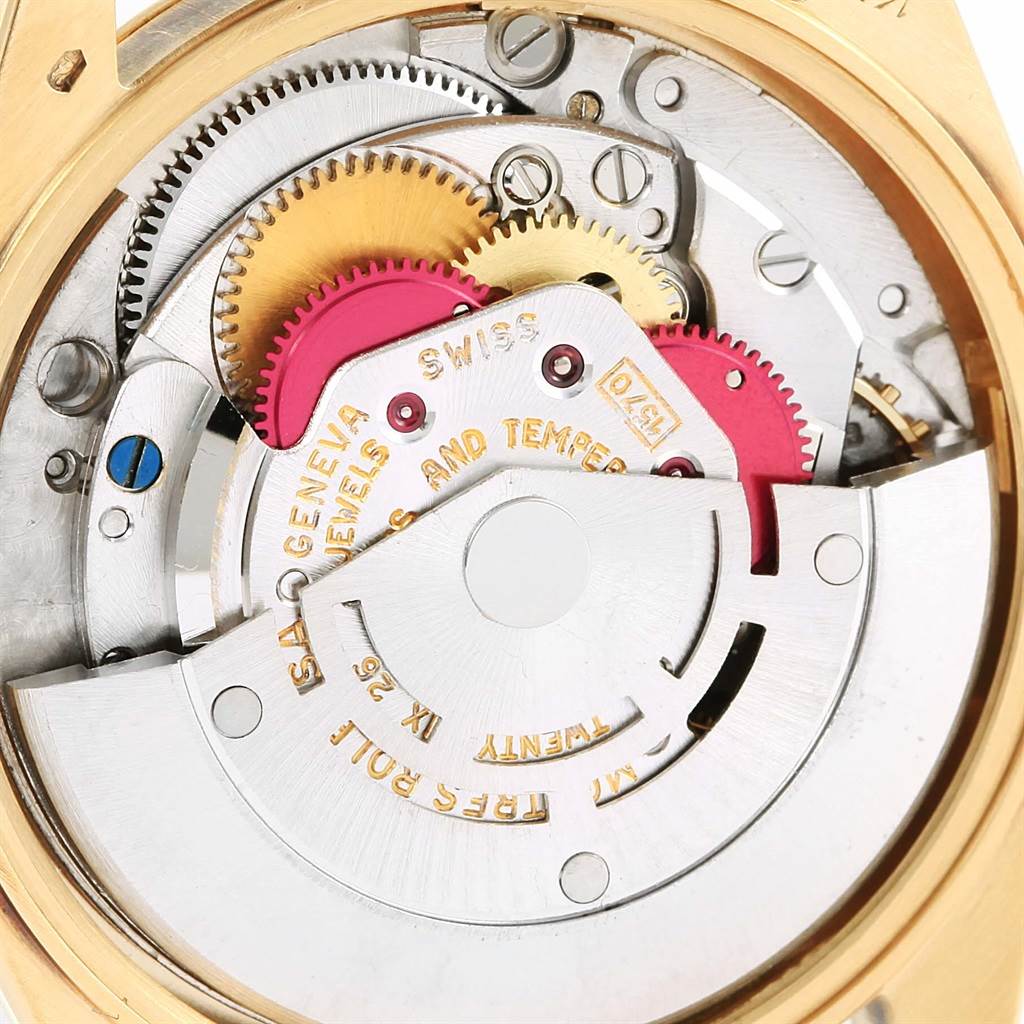 The image shows the internal mechanism of a Rolex Vintage Collection 1503 Men's Yellow Gold Champagne Dial 1503 Men's Yellow Gold Champagne Dial watch, highlighting gears and the rotor.