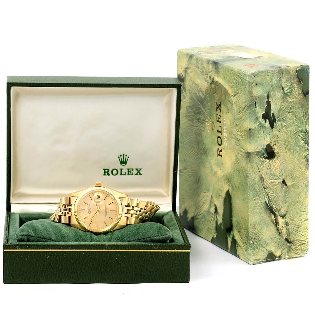The image shows a Rolex Vintage Collection 1503 Men's Yellow Gold Champagne Dial 1503 Men's Yellow Gold Champagne Dial watch and its box from a front angle.