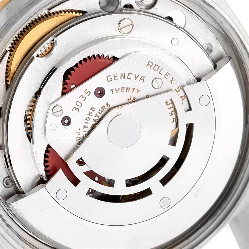 The image shows the internal movement mechanism of a Vintage Collection Rolex watch at a close-up angle.