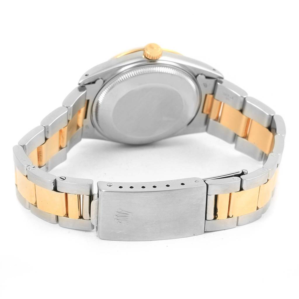 This is the back view of the Rolex Vintage Collection 15003 Men's Steel and Gold (two tone) Champagne Dial 15003 Men's Steel and Gold (two tone) Champagne Dial watch, showcasing its clasp and two-tone bracelet.