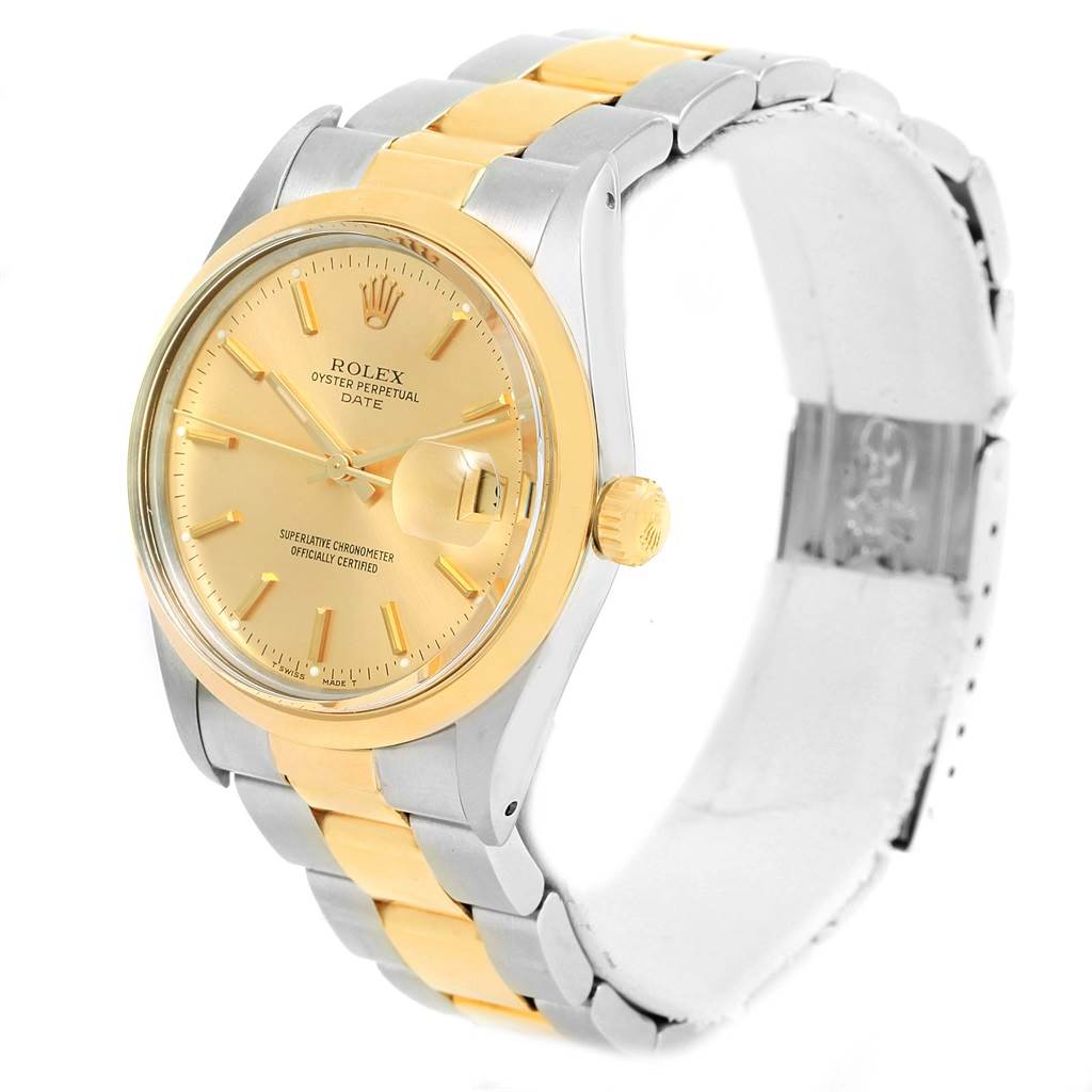 The image shows a side view of the Rolex Vintage Collection 15003 Men's Steel and Gold (two tone) Champagne Dial 15003 Men's Steel and Gold (two tone) Champagne Dial watch, displaying its gold dial, crown, and bi-metallic bracelet.
